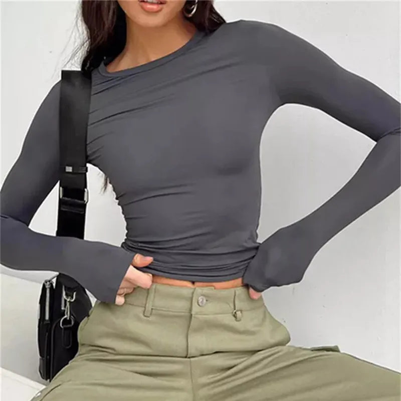 Model wearing Vespera Celestia Long Sleeve Top  – high stretch fitted long sleeve top in sleek, minimalist style by Vespera The Label.