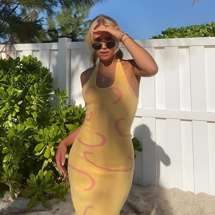 Model wearing Vespera Ceres Midi Dress – geometric cotton bodycon midi dress with stretch comfort by Vespera The Label.