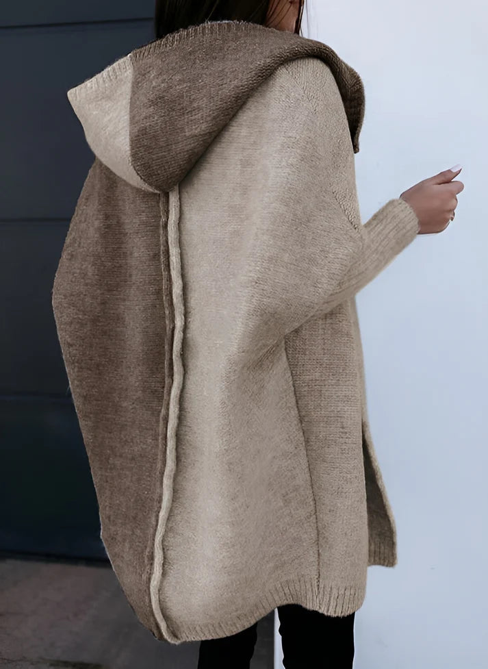 Model wearing Vespera Eos Sweater – long loose-fit women’s patchwork knit sweater for winter, by Vespera The Label