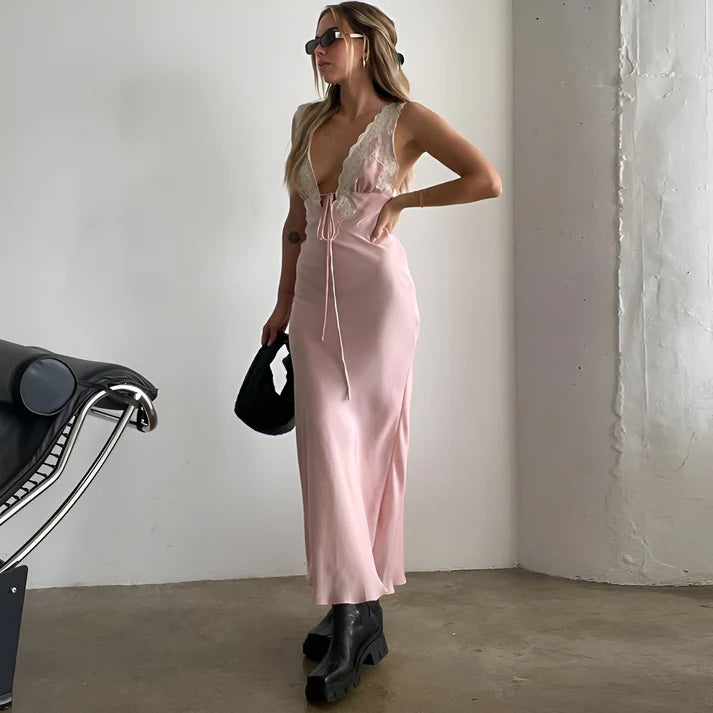 Model wearing Vespera Janus Maxi Dress – slim fit printed summer beach maxi with lace accents by Vespera The Label.