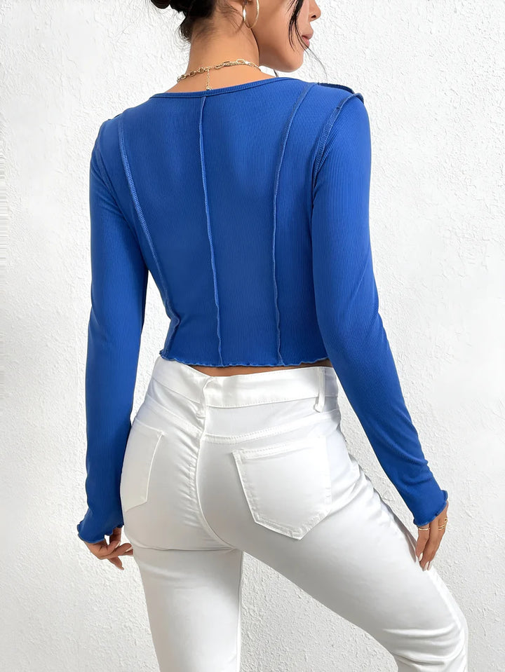 Model wearing Vespera Thalyn Top – slim winter knit top with irregular stitching detail by Vespera The Label.
