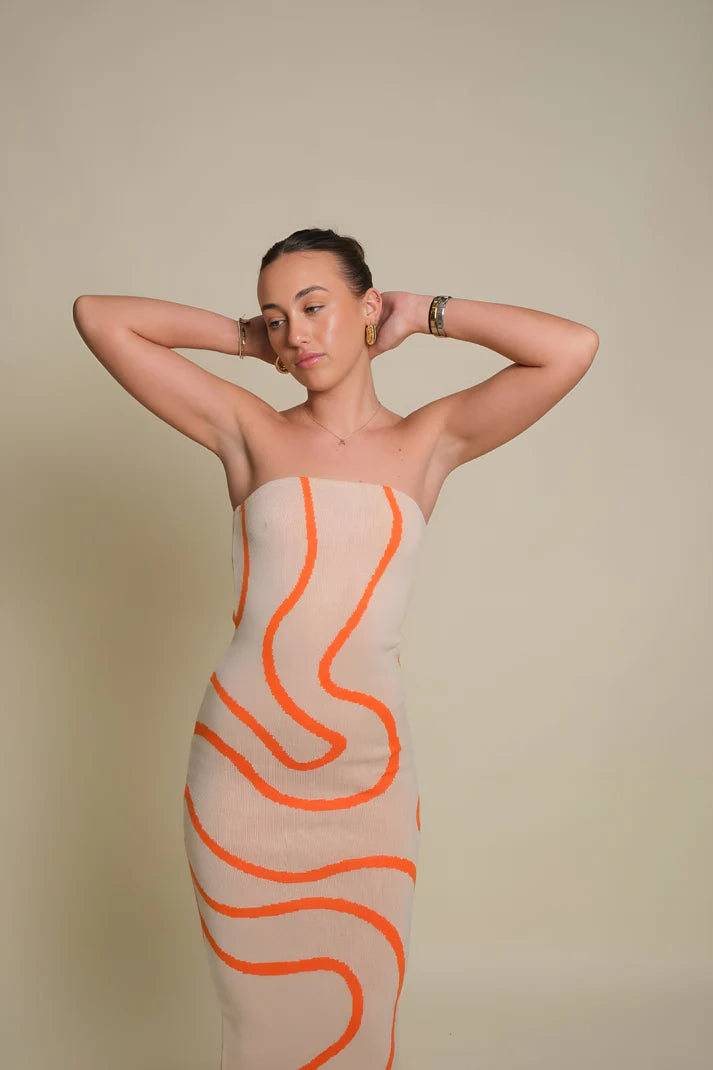 Model wearing Vespera Venus Midi Dress – striped cotton knit bodycon midi with all-season versatility by Vespera The Label.